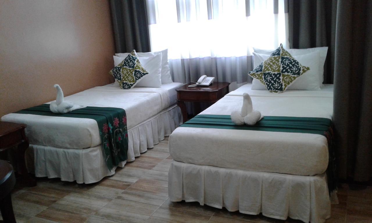 Charos Dormitel Hotel Dumaguete City Екстериор снимка