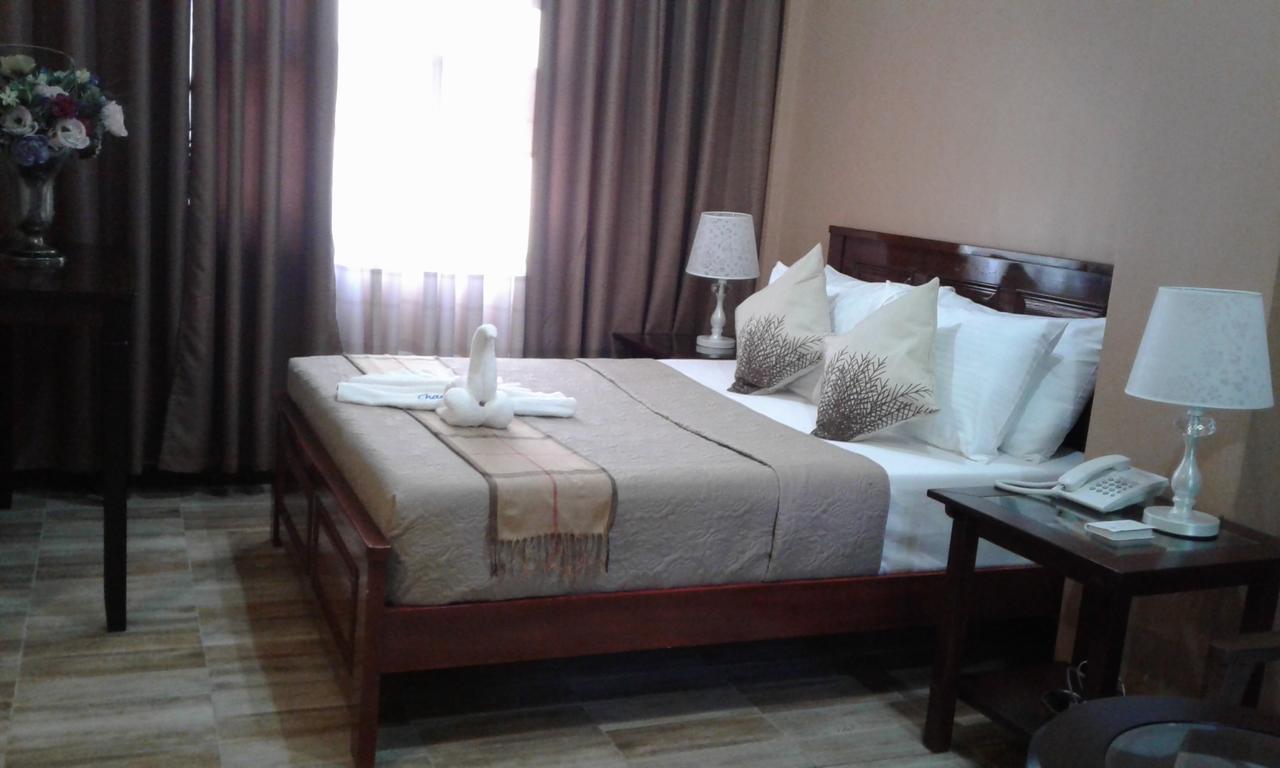 Charos Dormitel Hotel Dumaguete City Екстериор снимка