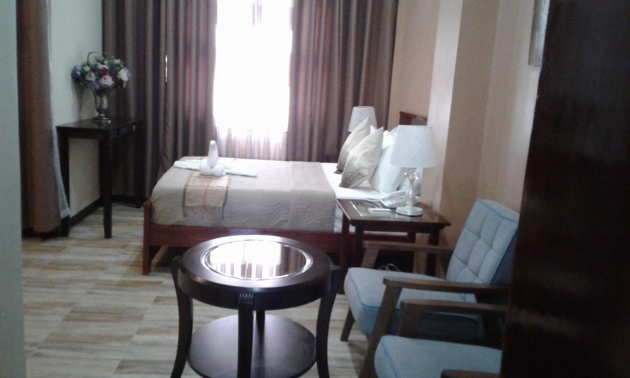 Charos Dormitel Hotel Dumaguete City Екстериор снимка