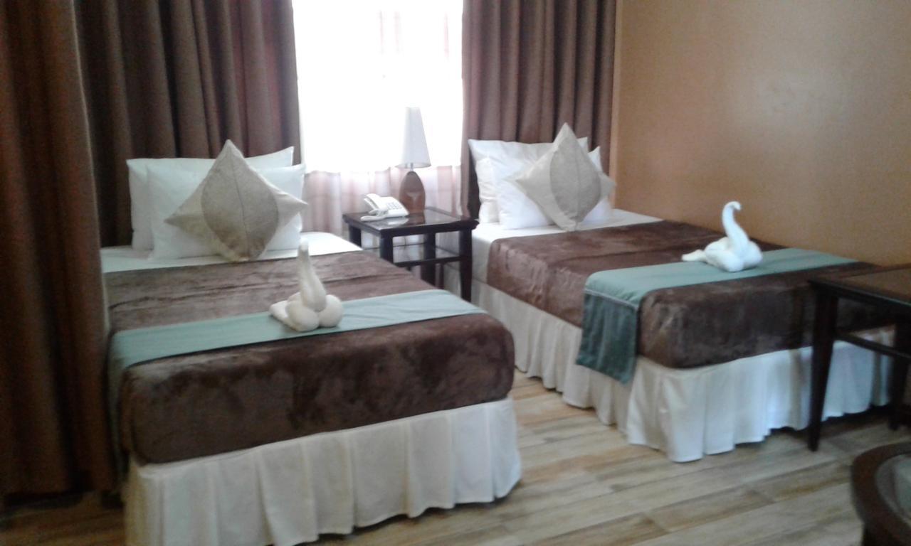 Charos Dormitel Hotel Dumaguete City Екстериор снимка