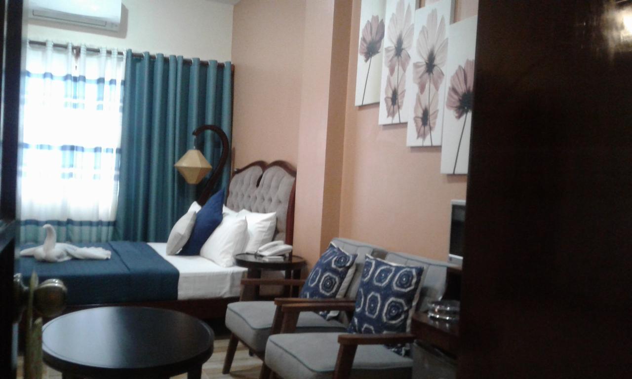 Charos Dormitel Hotel Dumaguete City Екстериор снимка